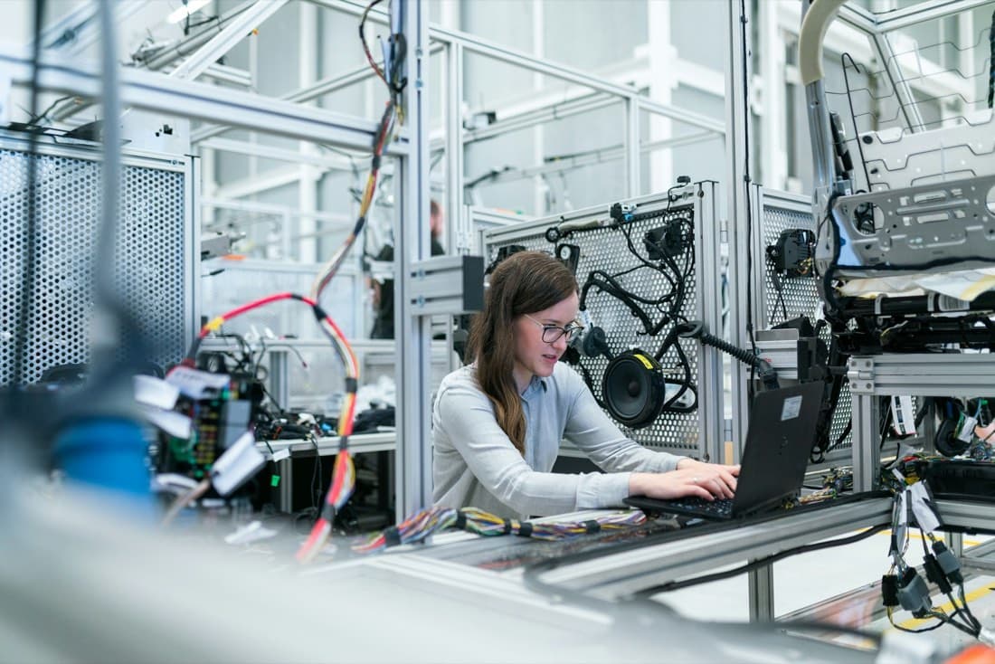 An analyst working with data on screen